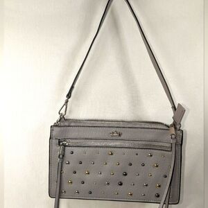 JUICY COUTURE GRAY AUDRINA SHOULDER BAG WRISTLET WITH TRI-COLOR STUDS.